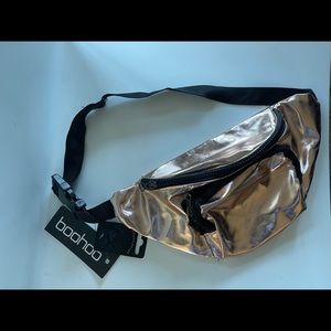 boohoo Fanny pack. Shinny rose gold color. New with tags.